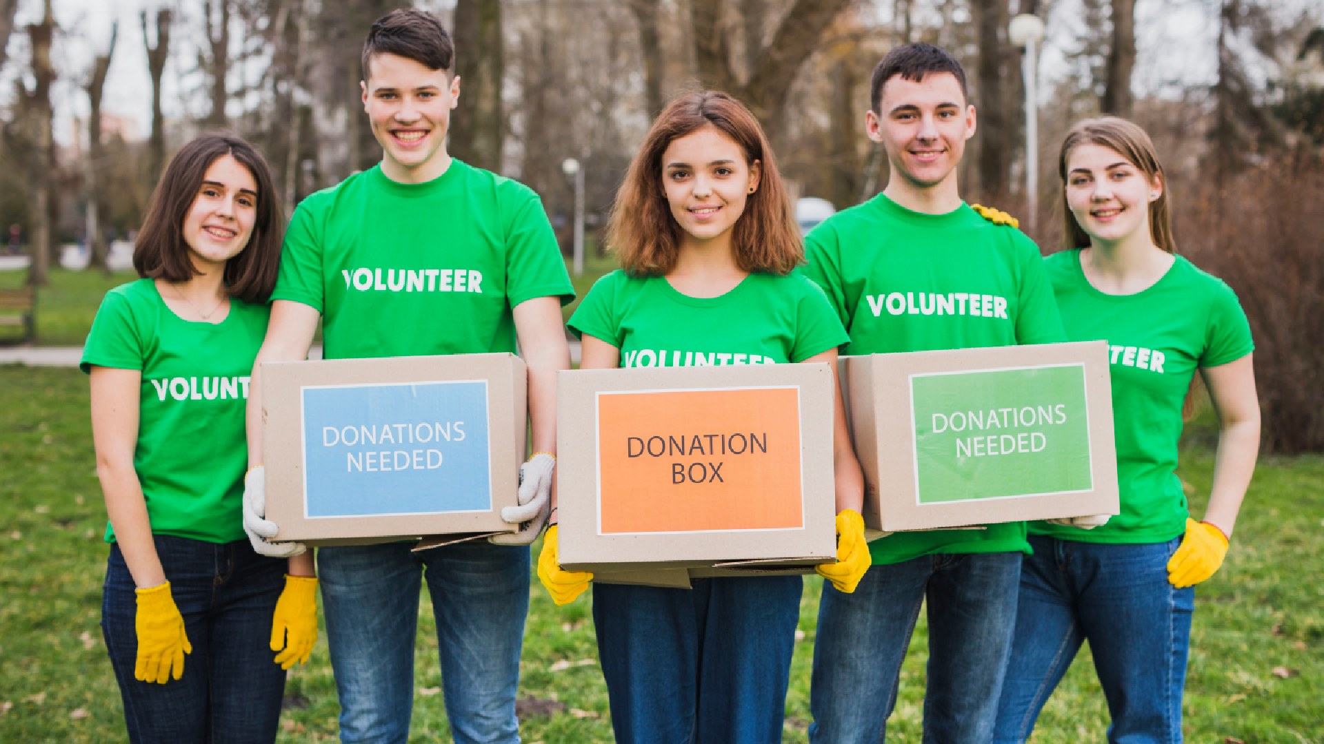 environment-volunteer-concept-with-persons-holding-boxes-donations