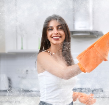 woman-washing-window woman-washing-window